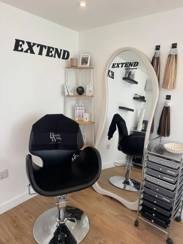 Connie’s one-to-one salon, with the Extend sign, styling chair and arched mirror